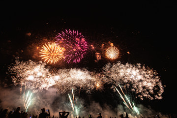 Real Fireworks footage 4k video on Deep Black Background Sky on Futuristic Fireworks festival show...