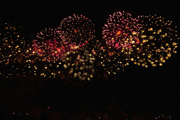 Real Fireworks footage 4k video on Deep Black Background Sky on Futuristic Fireworks festival show...