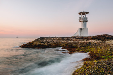 Obraz premium Lighthouse with the sunset at Nang Thong Beach Khao Lak Thailand