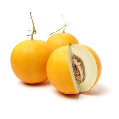 yellow honeydew melons isolated on white background 