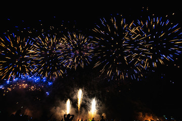 Real Fireworks footage 4k video on Deep Black Background Sky on Futuristic Fireworks festival show...