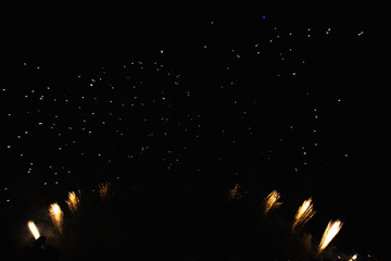 Real Fireworks footage 4k video on Deep Black Background Sky on Futuristic Fireworks festival show...