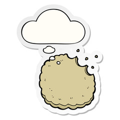 cartoon biscuit and thought bubble as a printed sticker