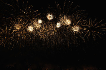 Real Fireworks footage 4k video on Deep Black Background Sky on Futuristic Fireworks festival show...
