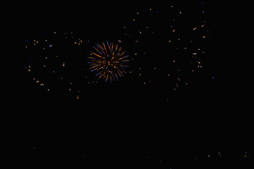 Real Fireworks footage 4k video on Deep Black Background Sky on Futuristic Fireworks festival show before independence day on 4 of July
