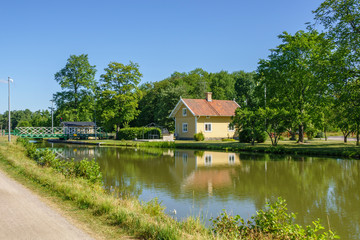 Fototapeta na wymiar Idyllic canal cottage by Gota canal in Sweden
