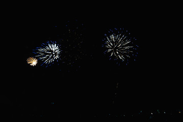 Real Fireworks footage 4k video on Deep Black Background Sky on Futuristic Fireworks festival show...