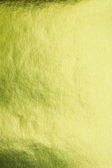Gold foil leaf shiny wrapping paper texture background for wall paper decoration element