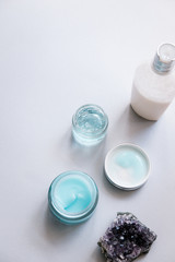 Female skin and body care cosmetic products set flatlay. Overhead, minimalism, beauty blogging concept