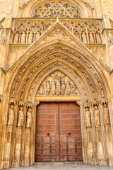The gothic door of the Metropolitan Cathedral–Basilica of the Assumption of Our Lady of Valencia, Spain