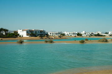 Venice Sands, Egypt. November 20 2018 Luxury villa by the sea with palm trees and a beach