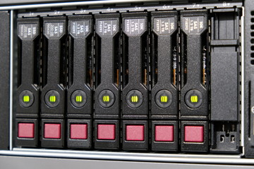 Disc enclosure from a server with 8 disks flashing green light, big data
