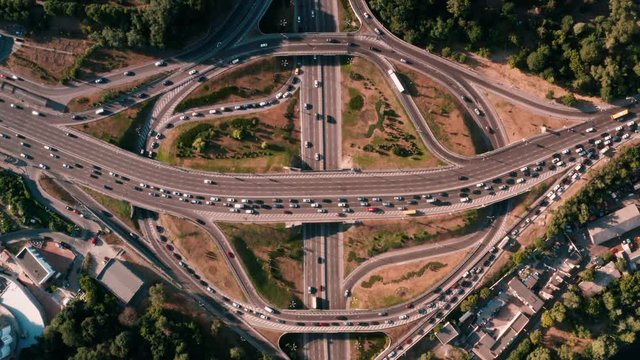 Drone view 4K static video camera looks down at a road junction