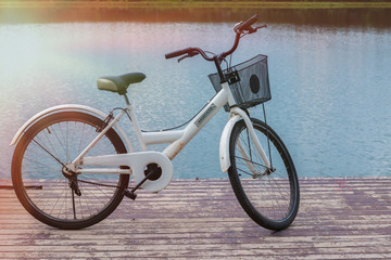 white bicycle  beautiful at park in the evening