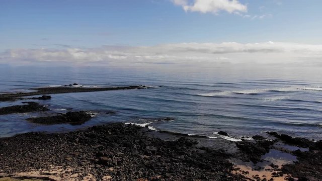 Iceland drone footage on the Ytri Tunga seal beach near the ocean in beautiful sunny spring weather