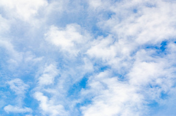 Blue sky and white clouds background.