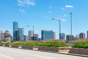 Planters with Flowers on Roosevelt Road with the South Loop Skyline in Chicago