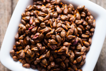 pile of grape seeds on porselain dish