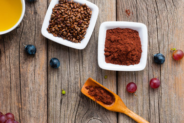 grape seed oil, grist and bunches on old wood