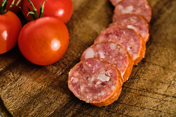 Sliced sausage and tomatoes