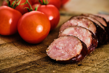 Sliced sausage and tomatoes