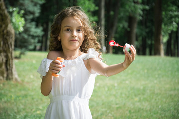 soap bubble little girl