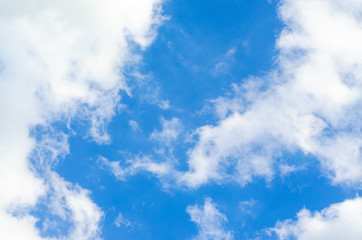 Blue sky and white clouds background.