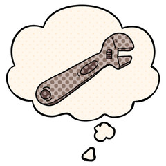 cartoon spanner and thought bubble in comic book style
