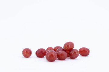 lose purple grapes on white background