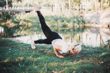 push up exercise with a raised leg hatha yoga or fitness 