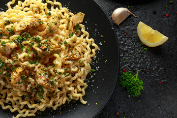 Artichoke hearts and lemon pasta with parmesan cheese and parsley