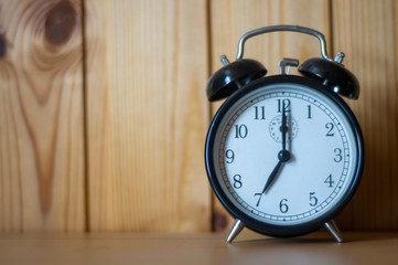 old alarm clock on the table