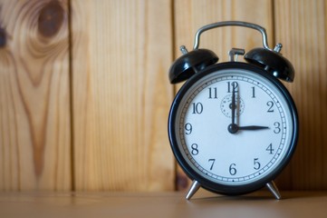 old alarm clock on the table