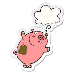 funny cartoon pig and thought bubble as a printed sticker