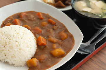 Curry rice , Japanese food on wooden table