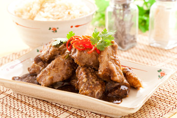 Fried pork spare ribs with garlic and pepper