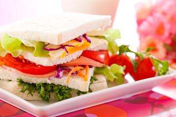 Breakfast sandwich ham and tomato