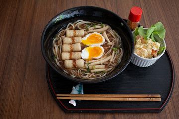 Japanese wheat noodle, Udon noodle on wooden table background