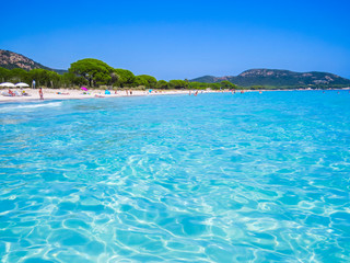 Fototapeta premium PALOMBAGGIA, FRANCE - AUGUST 4, 2014: Unidentified people on the beach of Palombaggia, Corsica.