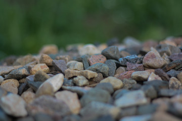 Stones of different shades on a blurred background