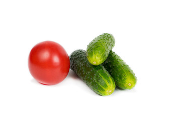 fresh tomato and cucumbers isolated on white background