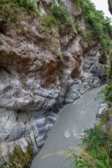 Dark river in taroko national park after rain storm in taiwan.