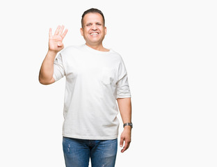 Middle age arab man wearig white t-shirt over isolated background showing and pointing up with fingers number four while smiling confident and happy.