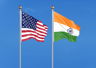 United States of America vs India. Thick colored silky flags of America and India. 3D illustration on sky background. - Illustration