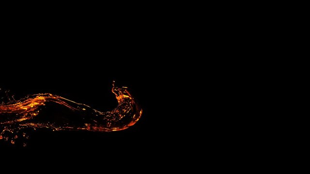 Super Slow Motion Shot of Golden Splash at 1000fps Isolated on Black Background.
