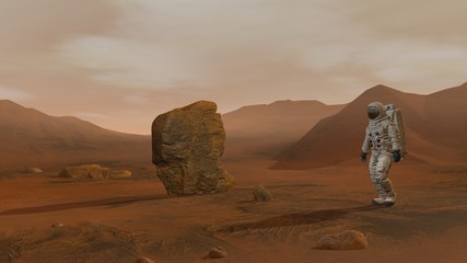 3D rendering. Colony on Mars. Two Astronauts Wearing Space Suit Walking On The Surface Of Mars. © merlin74
