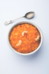 Sabudana or Sago Kesari dessert for Vrat Upvas also known as Sweetened Tapioca Pearl. served in a bowl. selective focus