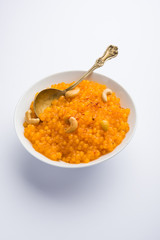Sabudana or Sago Kesari dessert for Vrat Upvas also known as Sweetened Tapioca Pearl. served in a bowl. selective focus