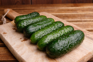 cucumbers on the kitchen board