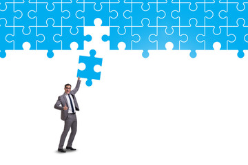 Concept of businessman with missing jigsaw puzzle piece